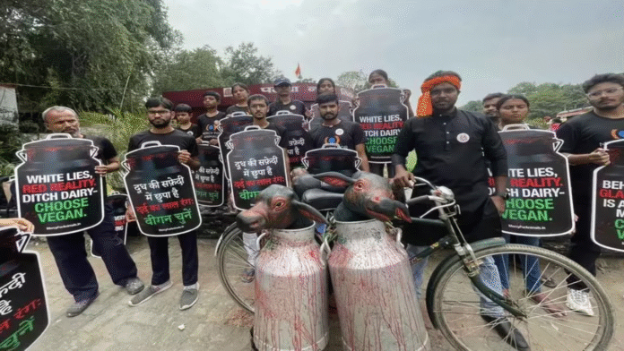 Protest against ‘dairy industry cruelty' held outside zoo